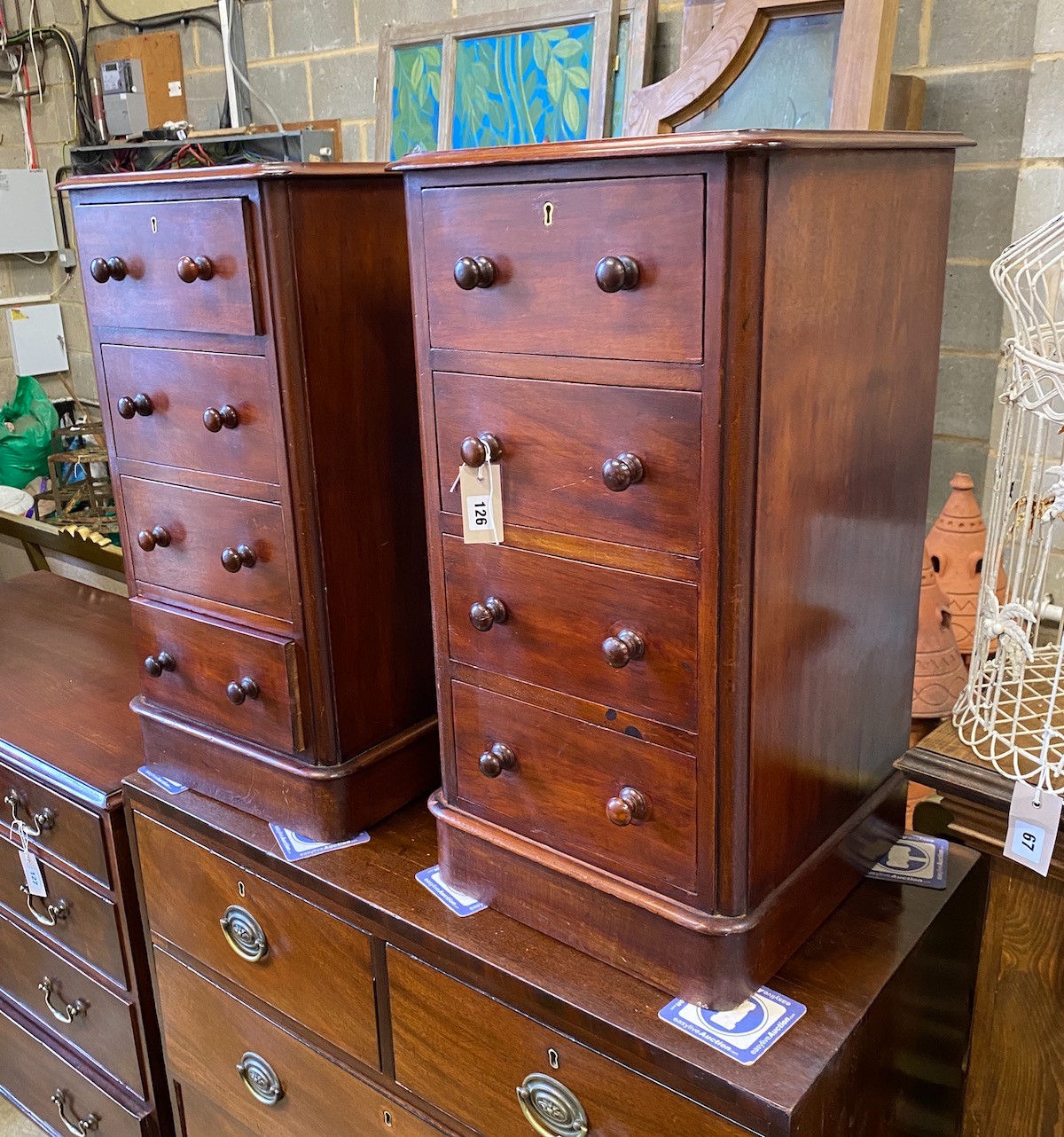 A pair of late Victorian four drawer mahogany bedside chests, altered, width 38cm, depth 39cm, height 72cm